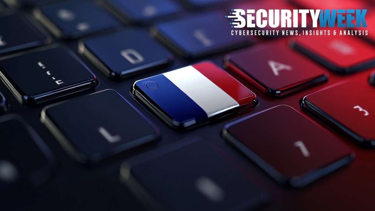 French flag on a keyboard symbolizing the breach of France's government messaging platform.